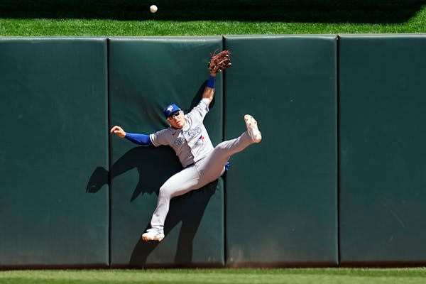 Blue Jays center fielder Daulton Varsho could not make the play, resulting in a two-run home run by the Twins' Willi Castro during the fifth inning Sa