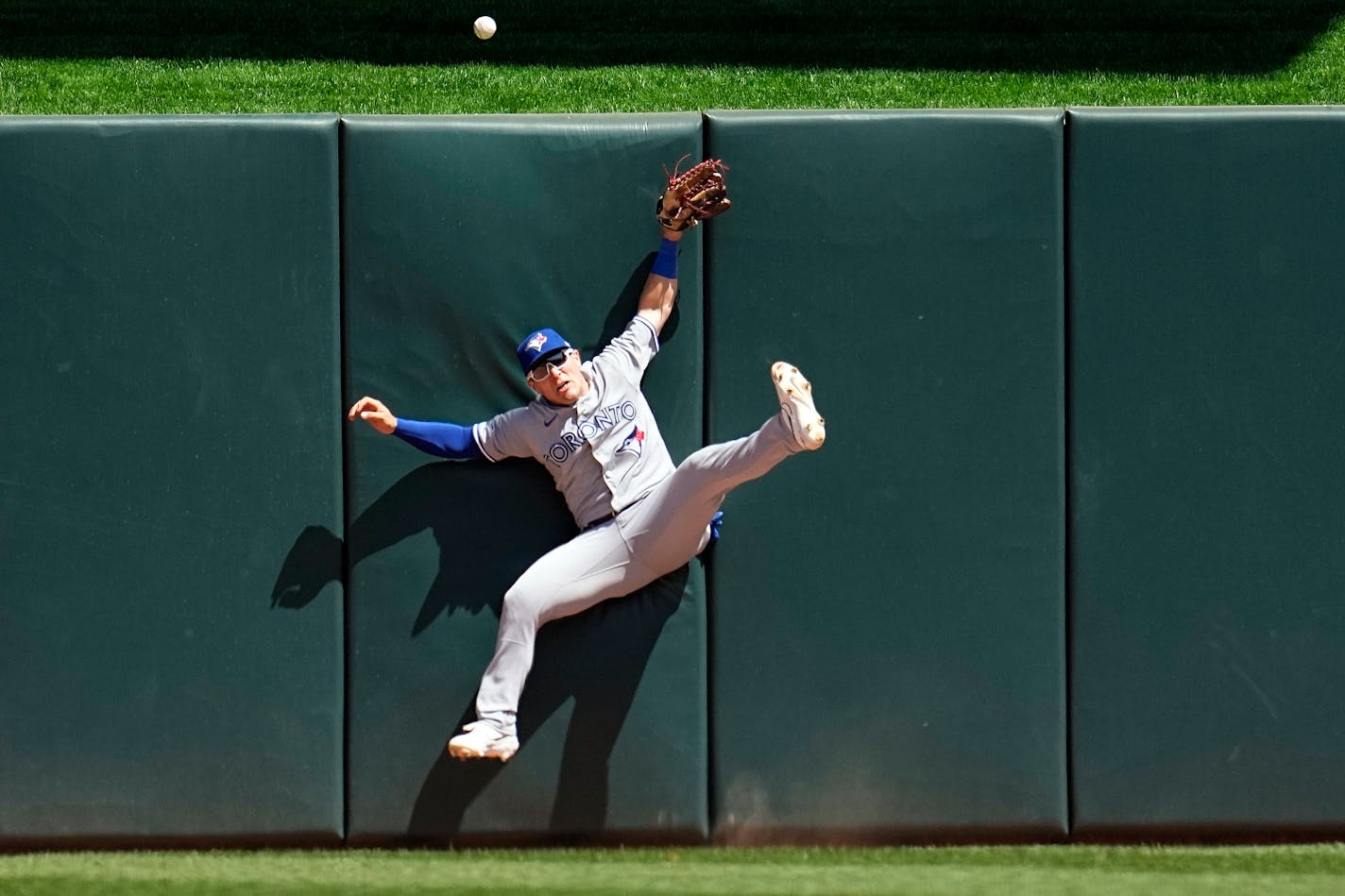 Blue Jays center fielder Daulton Varsho could not make the play, resulting in a two-run home run by the Twins' Willi Castro during the fifth inning Saturday