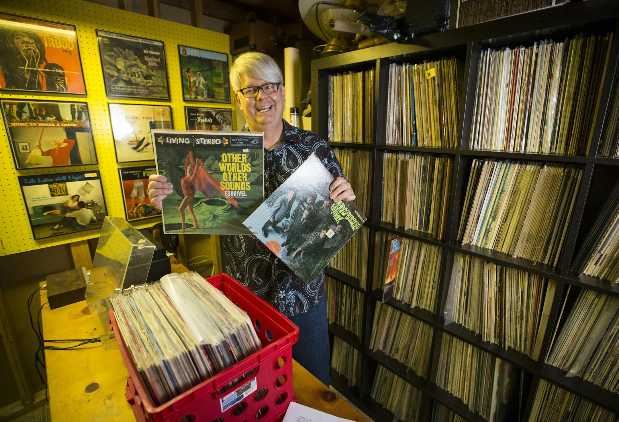 Glen Leslie, host of The Jet Set Planet radio show on KFAI, showed off the first two records he bought at thrift stores, now part of a 6,000-album collection he stores in the basement of his house in New Hope.