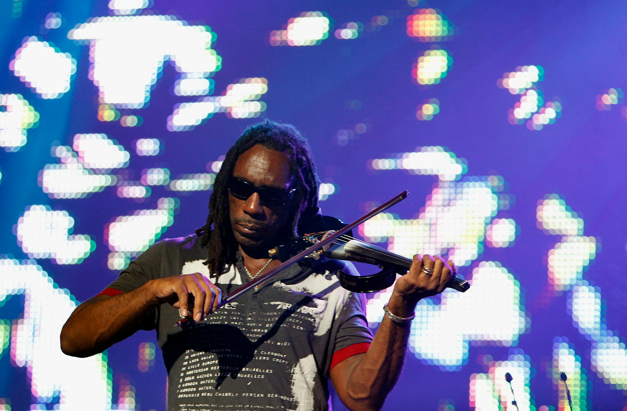 Boyd Tinsley, violin player of The Dave Matthews Band performed at the Xcel Energy Center on Wednesday night.