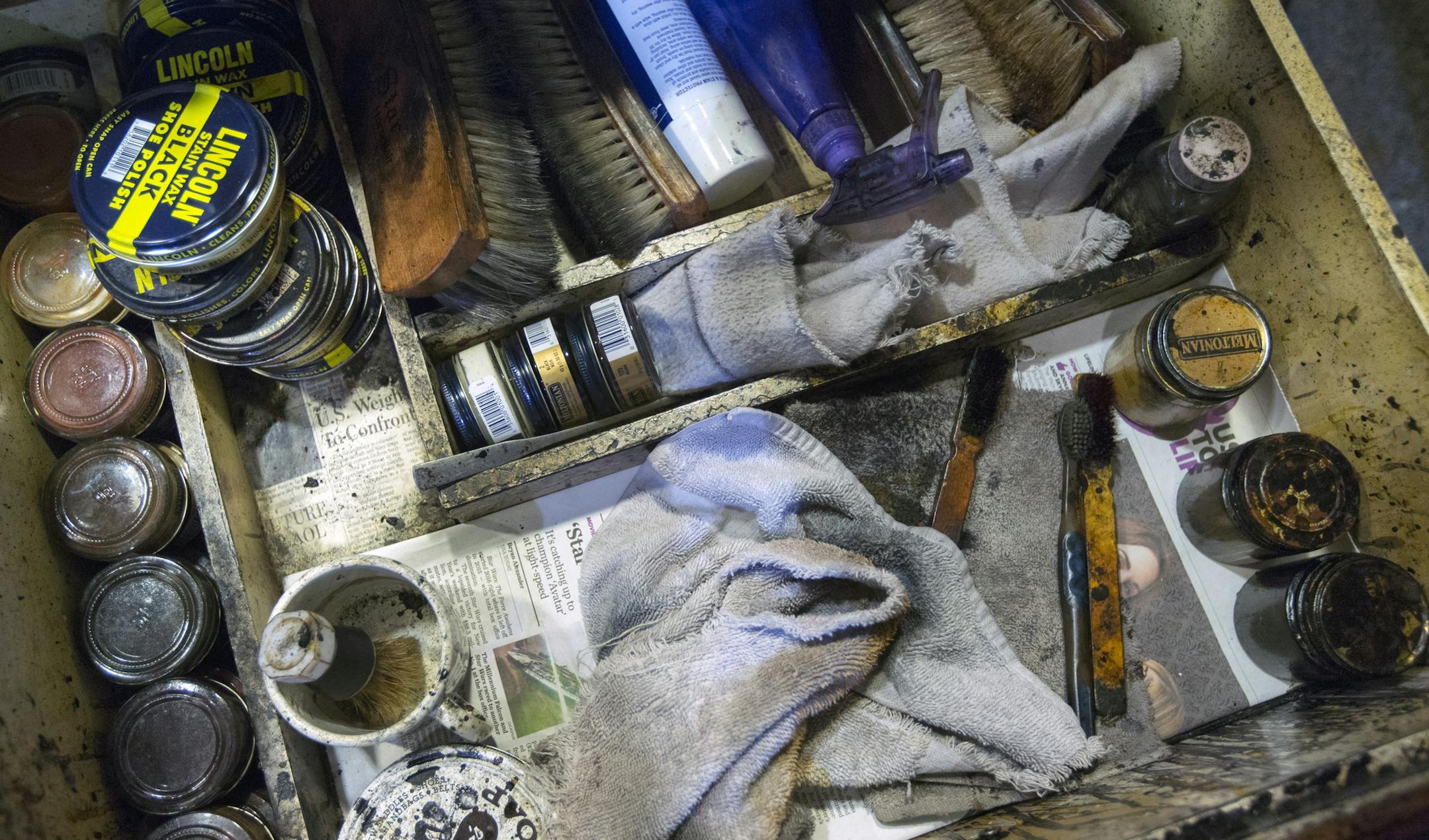 Lisa's Shoe Shine has been in the IDS Crystal Court for 25 years. Notable for that, but she's also a rare female shoeshiner. Best job she's ever had, she says. Here, Lisa tools of the trade.] Brian.Peterson@startribune.com Minneapolis, MN - 01/28/2016