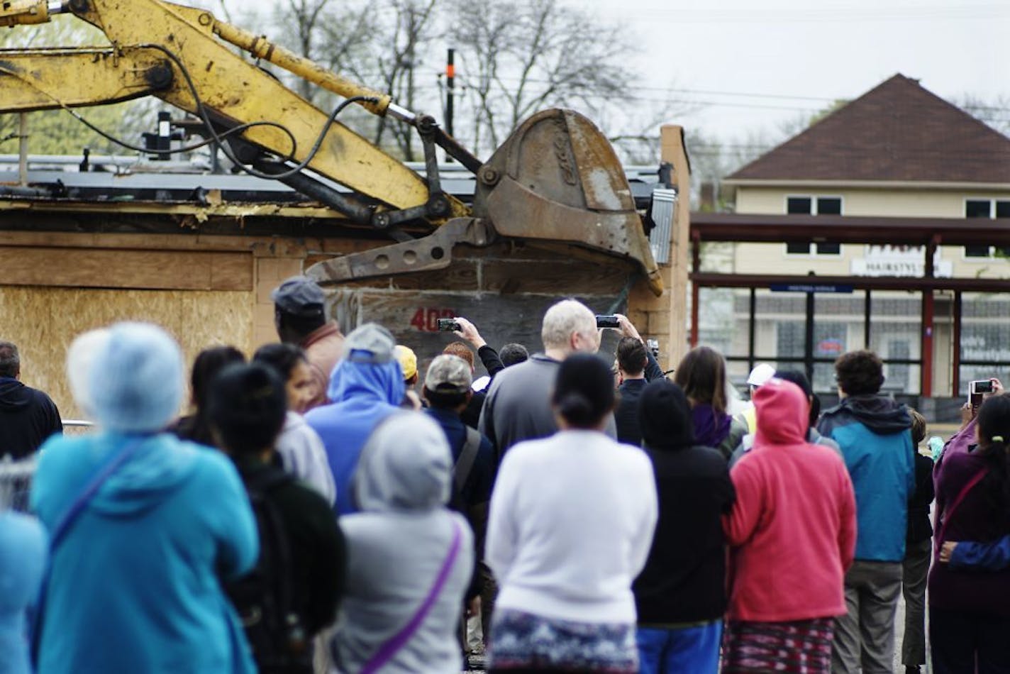 Demolition began at Little Mekong Plaza, a privately owned pubic space along the Green Line expected to become a key gathering place for the area's Hmong, Vietnamese and other immigrant communities.