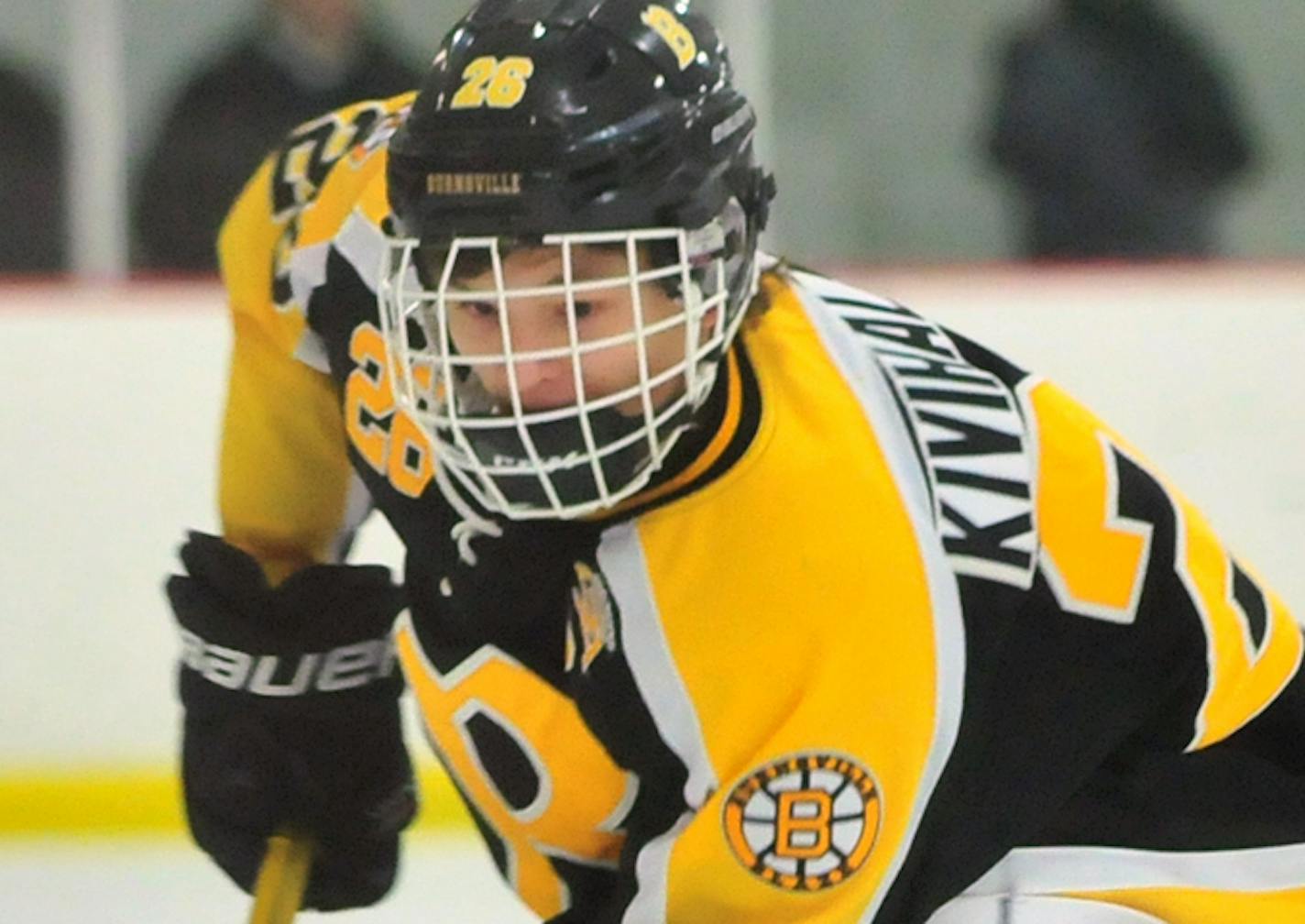 Burnsville's Teemu Kivihalme (left) moves the puck away from Eden Prairie's Mason Bergh (right) during the first period Tuesday night at Eden Prairie Community Center. ] (SPECIAL TO THE STAR TRIBUNE/BRE McGEE) **Teemu Kivhalme (left, 26), Mason Bergh (right, 15) ORG XMIT: MIN1212042029180542