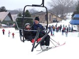 Heading uphill on a chairlift at Cascade Mountain in Portage, Wisconsin.