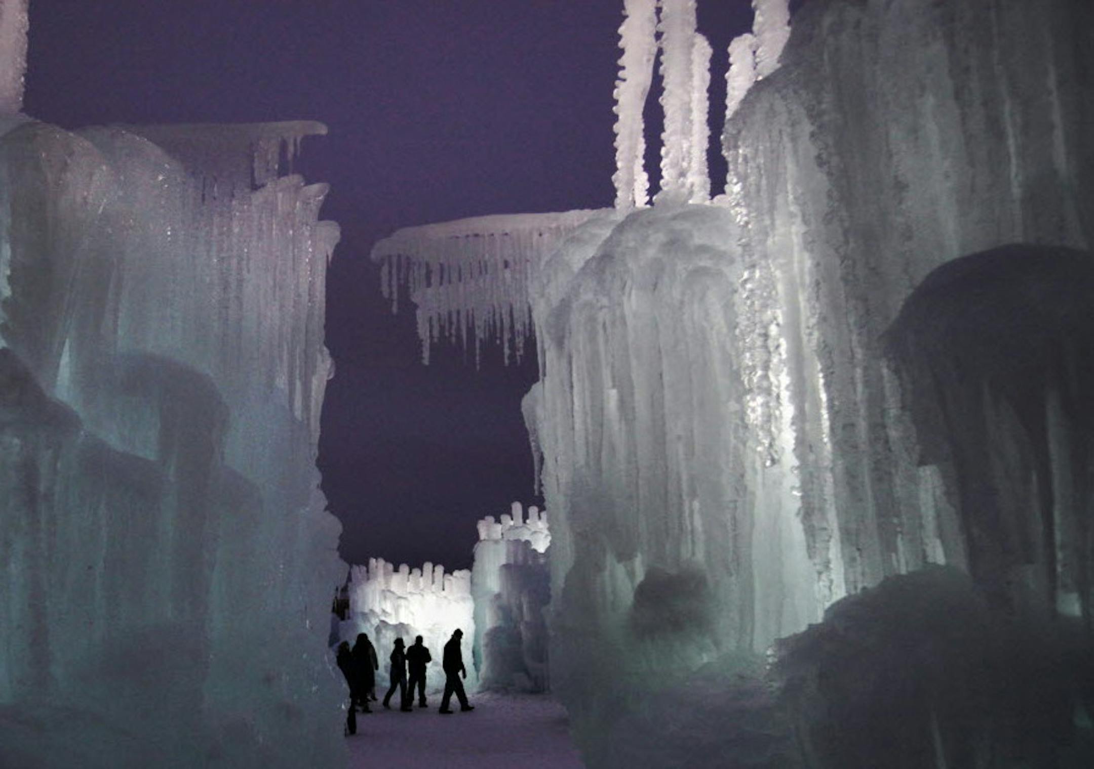 File photo by David Joles of the Star Tribune of visitors at the ice casltes Jan. 1, 2013 at the Mall of America parking lot in Bloomington. In 2014-2015, Ice Castles are coming to Eden Prairie's Miller Park.