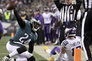 Philadelphia Eagles' Corey Graham reacts after intercepting a pass from Minnesota Vikings' Adam Thielen during the second half of the NFL football NFC