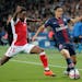 Reims' Romain Metanire (left), acquired by Minnesota United, battled Paris-Saint-Germain's Edinson Cavani during a French League One match Sept. 26 in