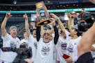 Minnesota State Mankato men's basketball coach Matt Margenthaler celebrated the NCAA Division II championship with his team on Saturday in Evansville,