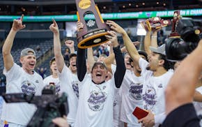 Minnesota State Mankato men's basketball coach Matt Margenthaler celebrated the NCAA Division II championship with his team on Saturday in Evansville,