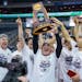 Minnesota State Mankato men's basketball coach Matt Margenthaler celebrated the NCAA Division II championship with his team on Saturday in Evansville,