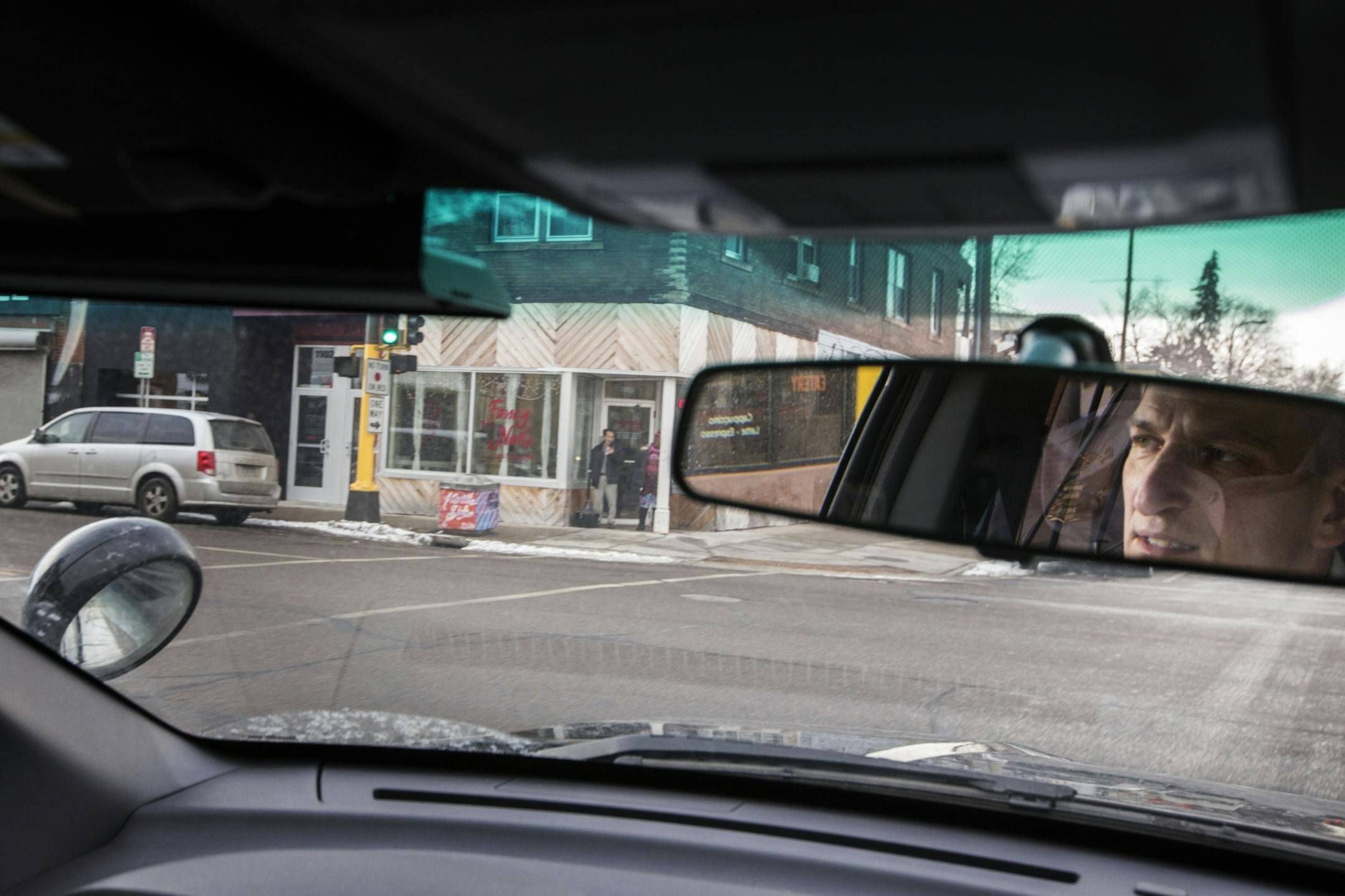 Inspector Mike Friestleben of Minneapolis Police Department's Fourth Precinct drives around his precinct in north Minneapolis on Wednesday, January 27, 2016.