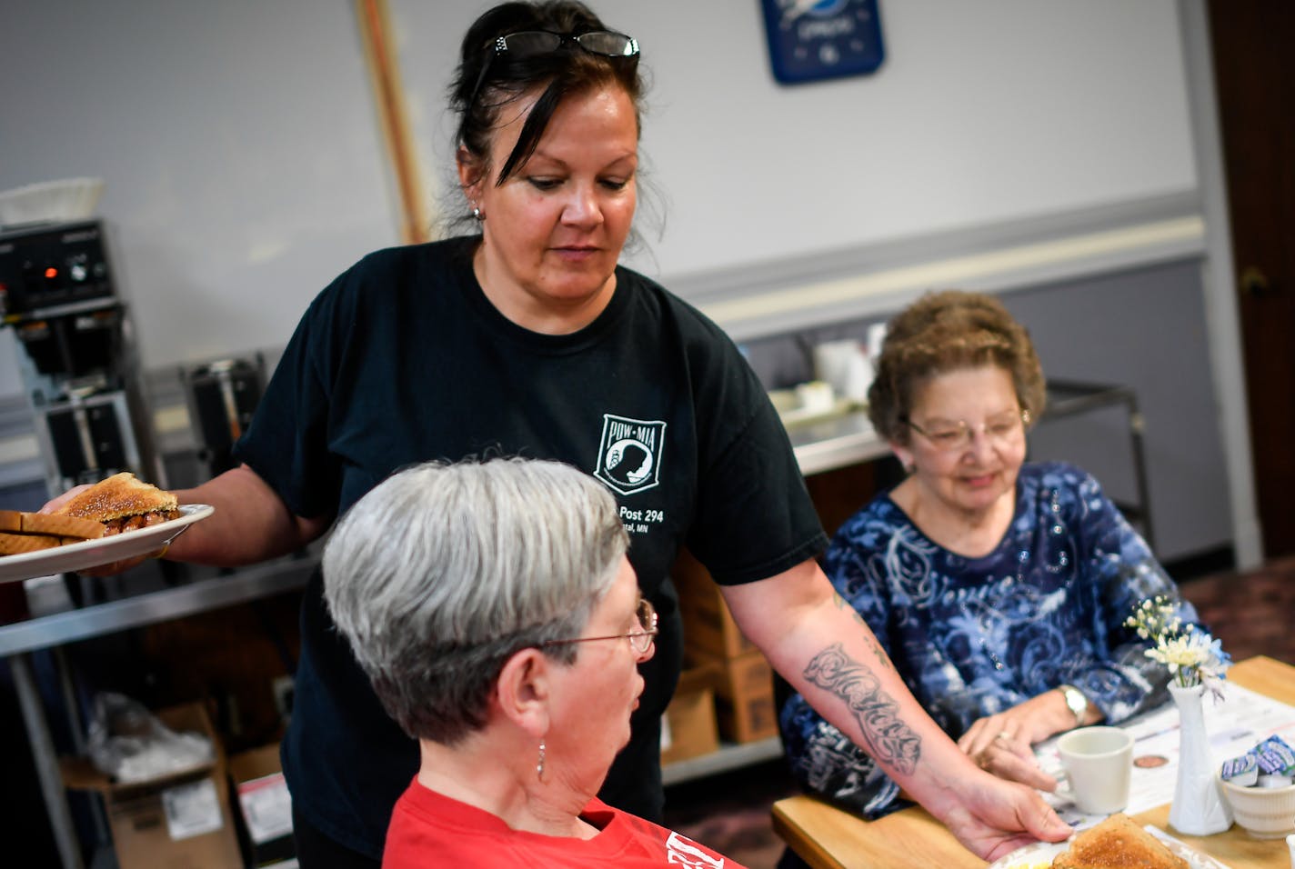 Carla Dahm, a proud Trump supporter and server at the Lake Crystal American Legion, served breakfast to fellow Trump voters Dora Gilman, bottom, and Janet Neumann Thursday morning. ] AARON LAVINSKY &#xef; aaron.lavinsky@startribune.com Photos to accompany our story about rural Trump voters in outstate Minnesota. We photograph voters in Blue Earth County on Thursday, June 1, 2017.