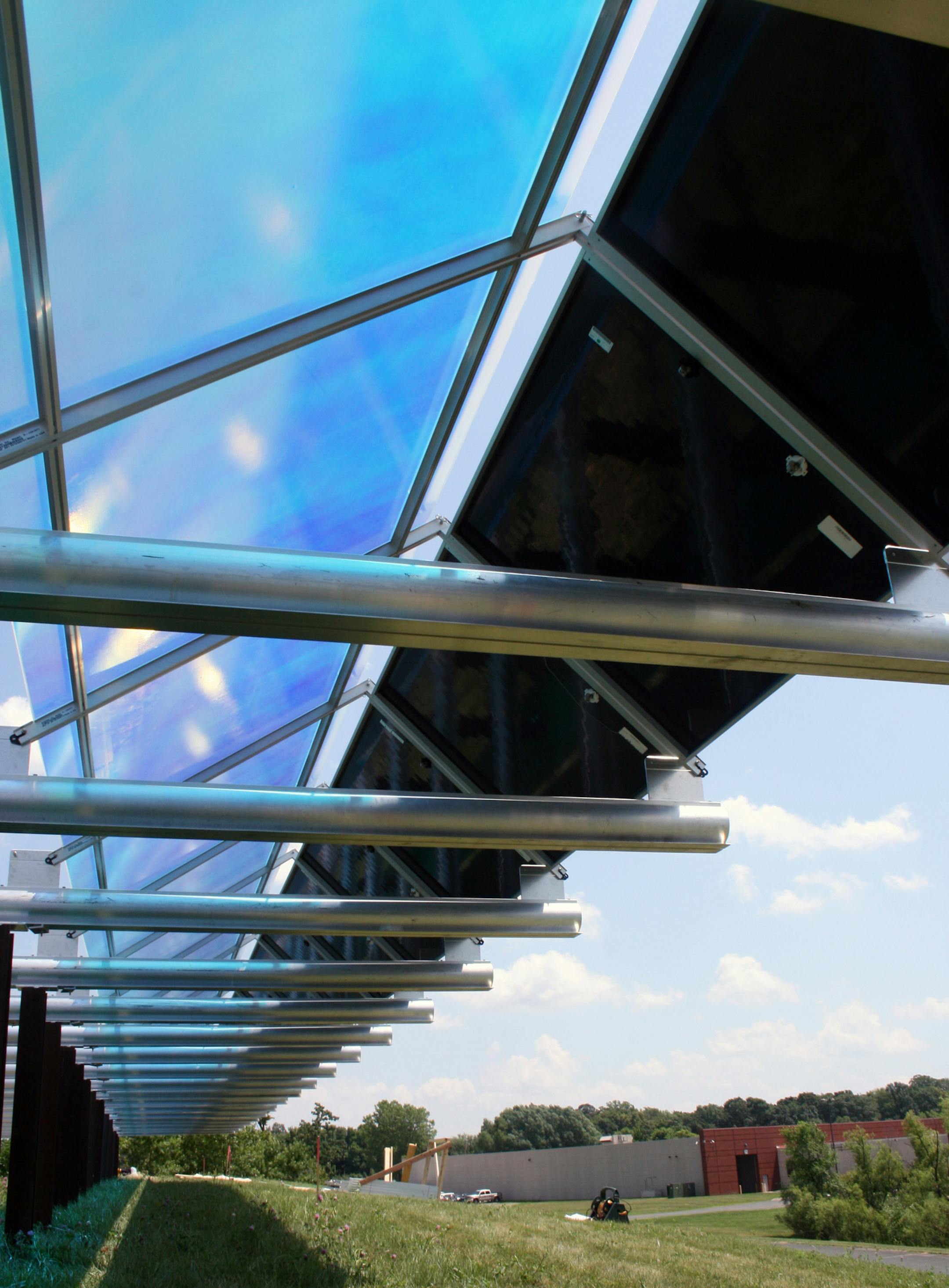 This July 2013 photo provided by the Wright Hennepin Cooperative Electric Association shows part of the first community solar array in Minnesota, in Rockford, Minn. A sweeping state energy law approved this spring demands that utilities generate or procure 1.5 percent of their power from solar sources by 2020 ó a big step up from where the state is now. Under that law, Xcel Energy Inc. has until Monday, Sept. 30, 2013, to tell how the giant electricity provider would like to manage the roll