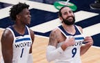Minnesota Timberwolves guard Anthony Edwards (1) and Minnesota Timberwolves guard Ricky Rubio (9) joked with each other as they took the court after a