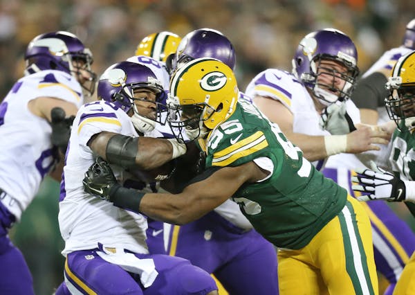 Former Vikings running back Adrian Peterson was stopped for no gain by former Packers defensive end Datone Jones in January, 2016.