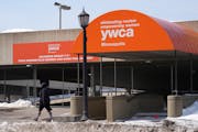 YWCA signage still hangs on the former Uptown facility on Friday.