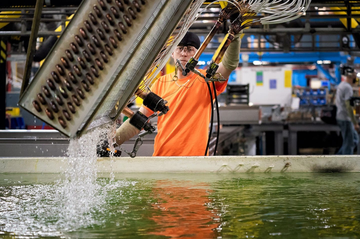 An HVAC worker at Daikin Applied North America in Faribault, Minn. (Glen Stubbe/Minneapolis Star Tribune) ORG XMIT: MIN1905141645095943