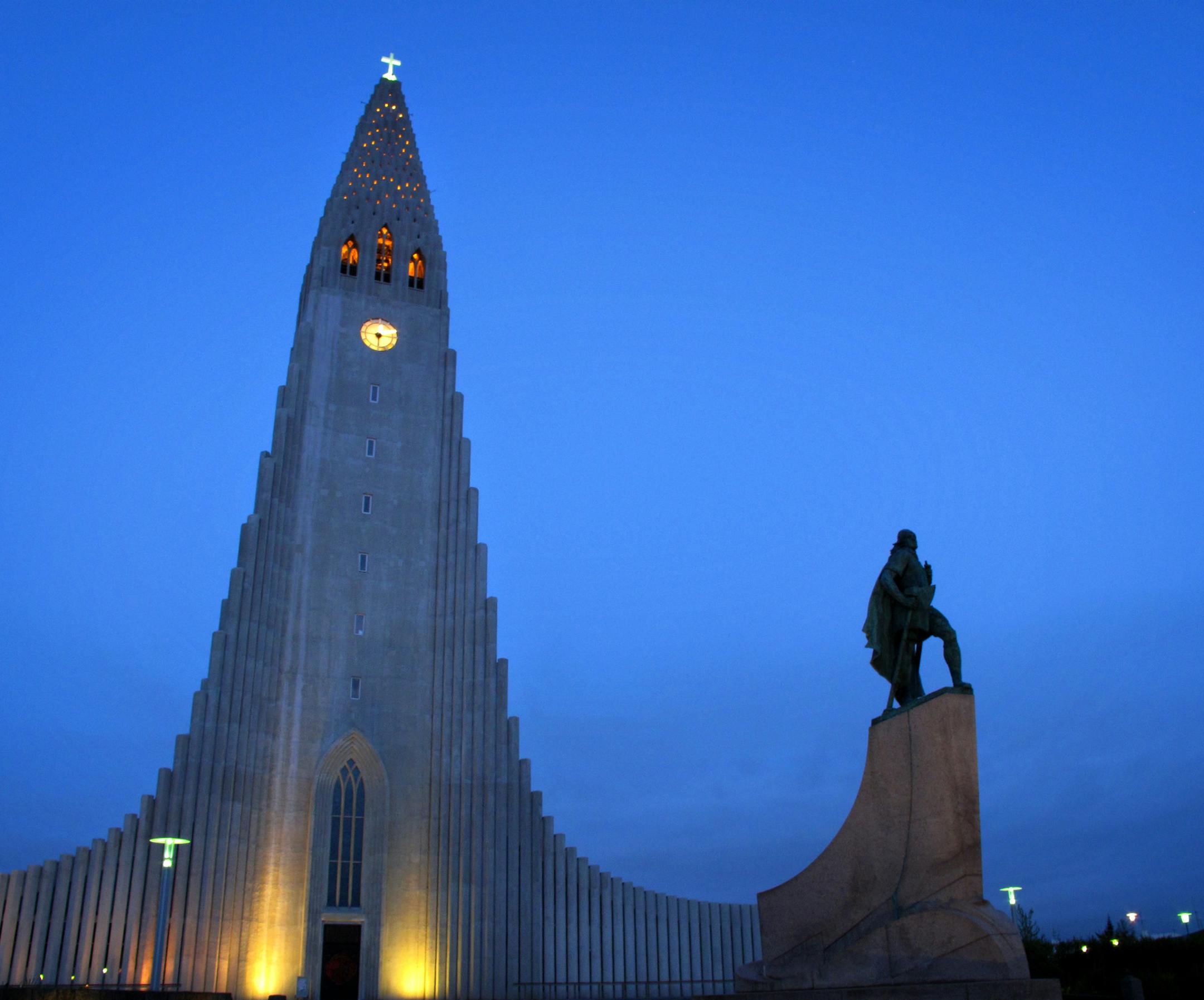 Jim Buchta photos of Iceland icelandTR0627 ] It took more than 30 years to build Hallgrims Church, the tallest church in Iceland. A statue of Leif Erickson stands watch.