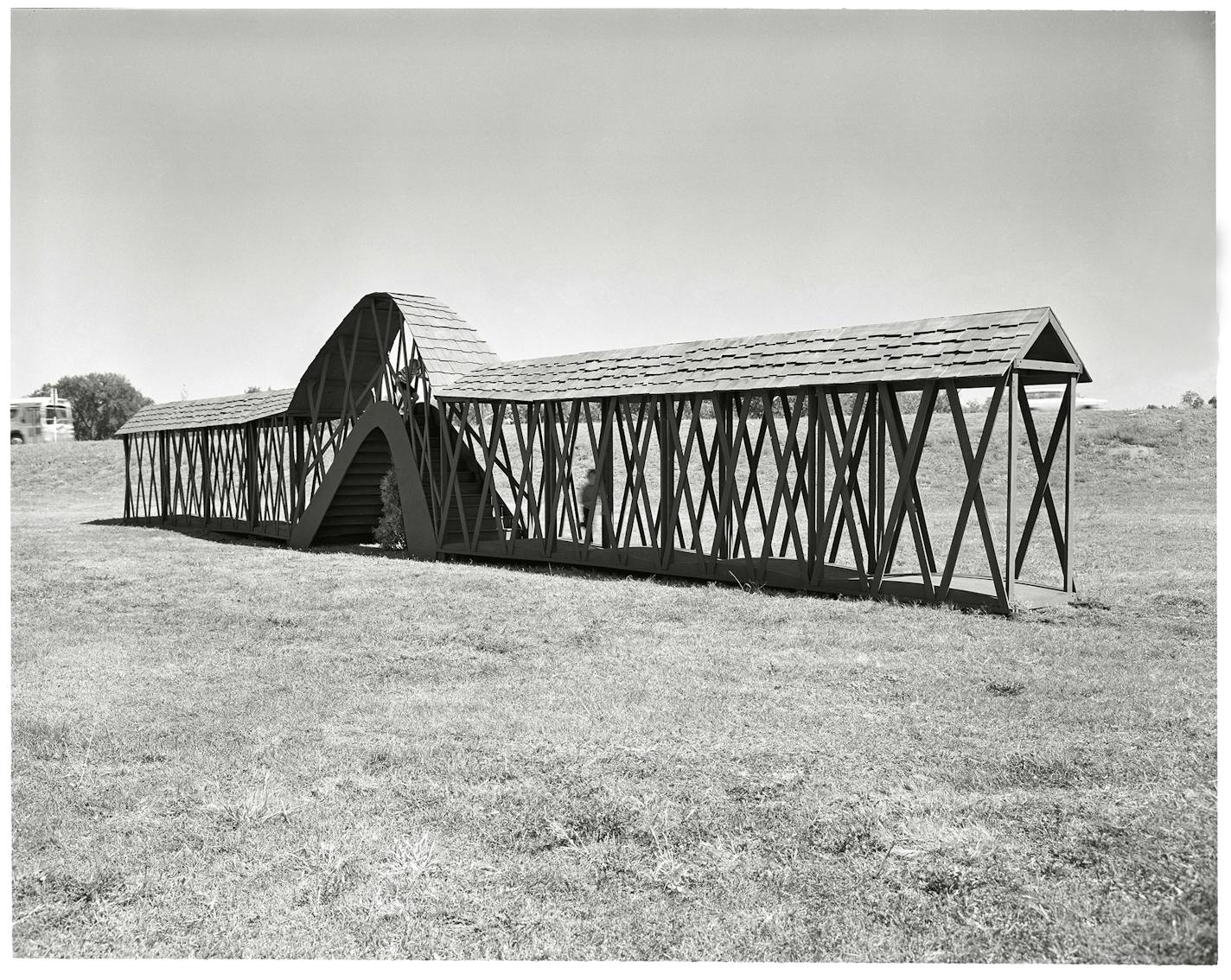 The Walker exhibited Armajani's "Bridge for a Tree" in what would later become the Minneapolis Sculpture Garden as part of an exhibition called "9 Artists/9 Spaces."