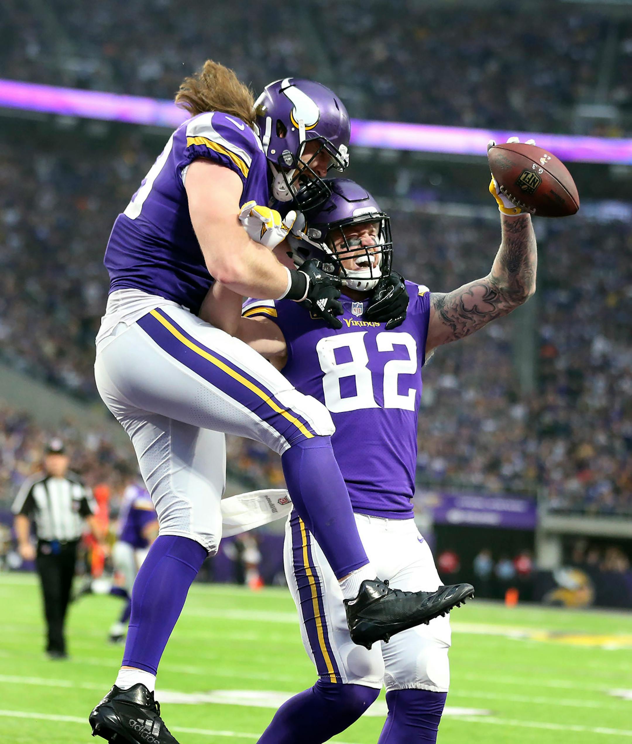 Minnesota Vikings tight end Kyle Rudolph (82) celebrated his one-yard touchdown catch with tight end David Morgan (89) in the forth quarter at U.S.Bank Stadium Sunday December 17, 2017 in Minneapolis, MN.