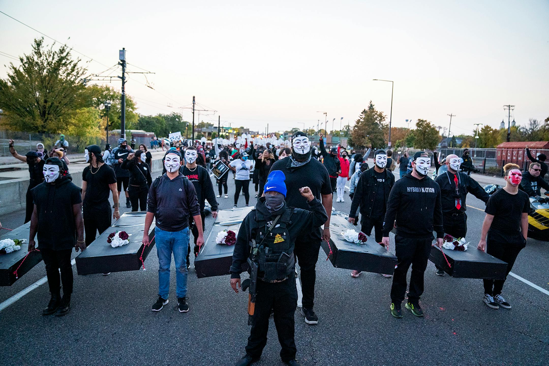 Families of those killed by police marched with hundreds of supporters in "The Secret March" down University Avenue to the Capitol in St. Paul.