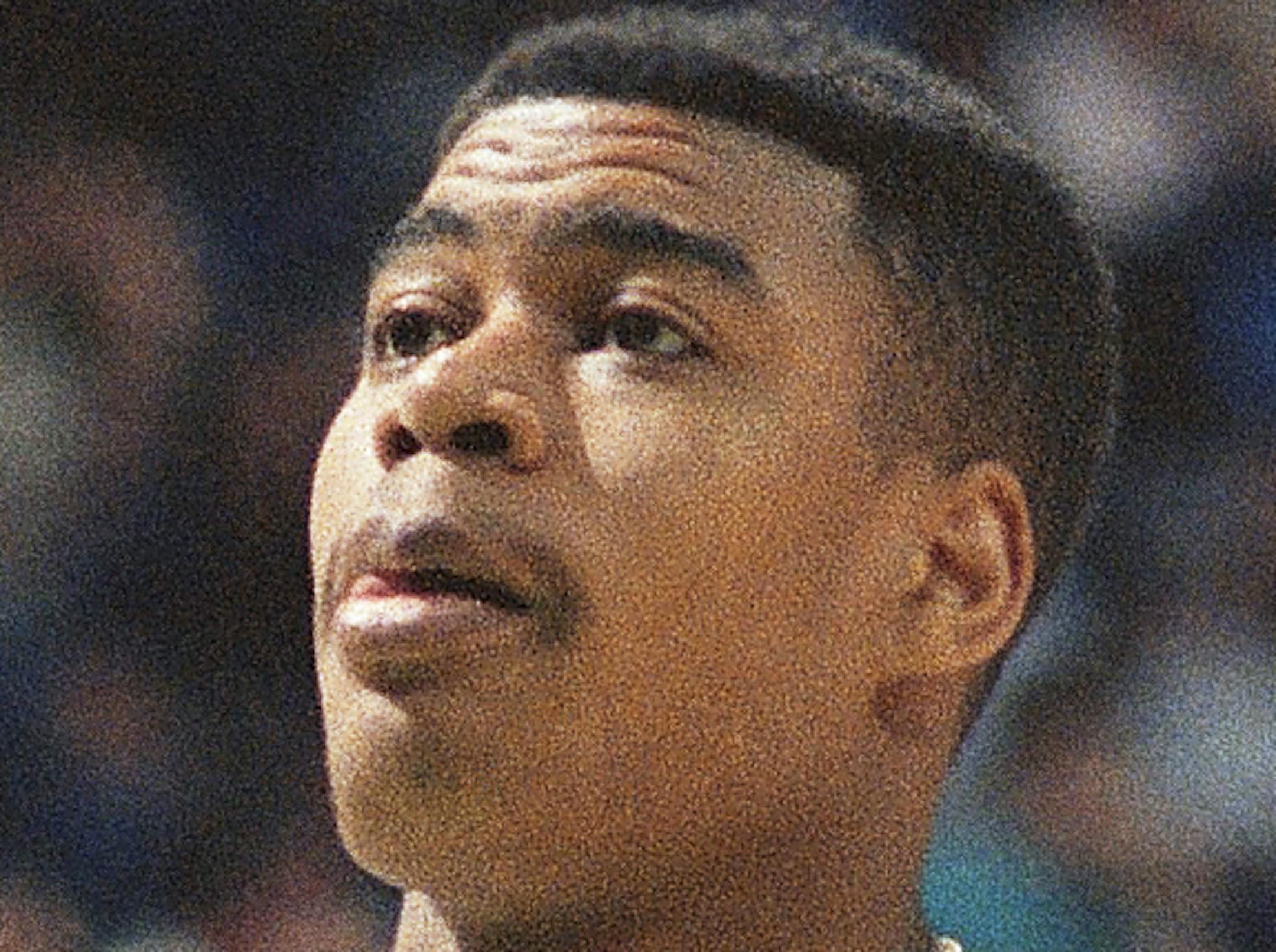 Louisville's star freshman Pervis Ellison is shown during a practice session at Reunion Arena in Dallas Friday, March 28, 1986. (AP Photo/David Breslauer) ORG XMIT: APHS109726