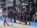 Denny Hamlin's crew cheers as Hamilin wins the NASCAR Aaron's 499 Sprint Cup series auto race at Talladega Superspeedway, Sunday, May 4, 2014, in Tall
