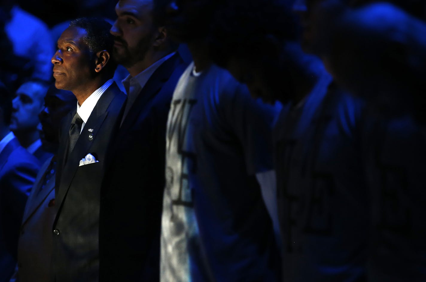 Minnesota Timberwolves interim head coach Sam Mitchell and team watched a tribute to the late Flip Saunders before the start of Monday night's home opener. ] CARLOS GONZALEZ &#xef; cgonzalez@startribune.com - November 2, 2015, Minneapolis, MN, Target Center, NBA, Minnesota Timberwolves vs. Portland Trailblazers