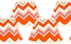 New Angle. Add a chevron graphic to shades with these ikat zig-zags in brights that measure 4 x 6 x 5 1/4 inches; they're six for $129.91 at Lamps Plu