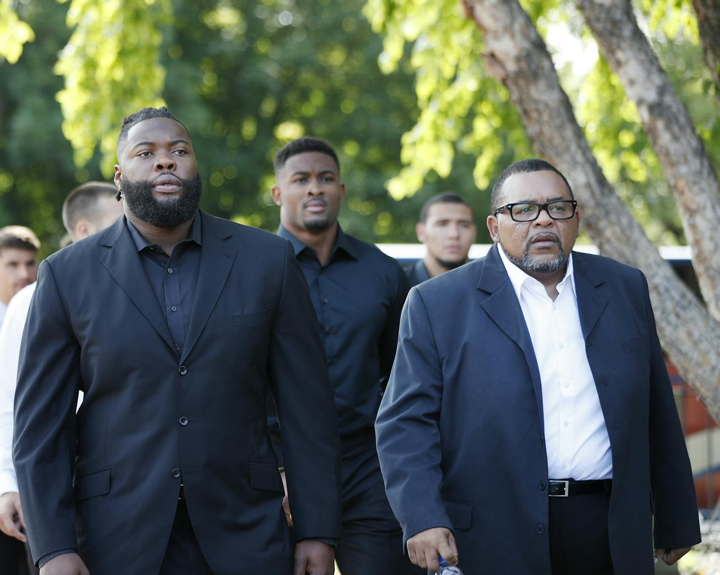 Vikings defensive tackle Linval Joseph left and defensive line coach Andre Patterson arrived with teammates for the funeral service of Vikings offensive line coach, Tony Sparano at St. Bartholomew Catholic Faith Community Church Friday July 27, 2018 in Wayzata,MN. ] JERRY HOLT &#xef; jerry.holt@startribune.com