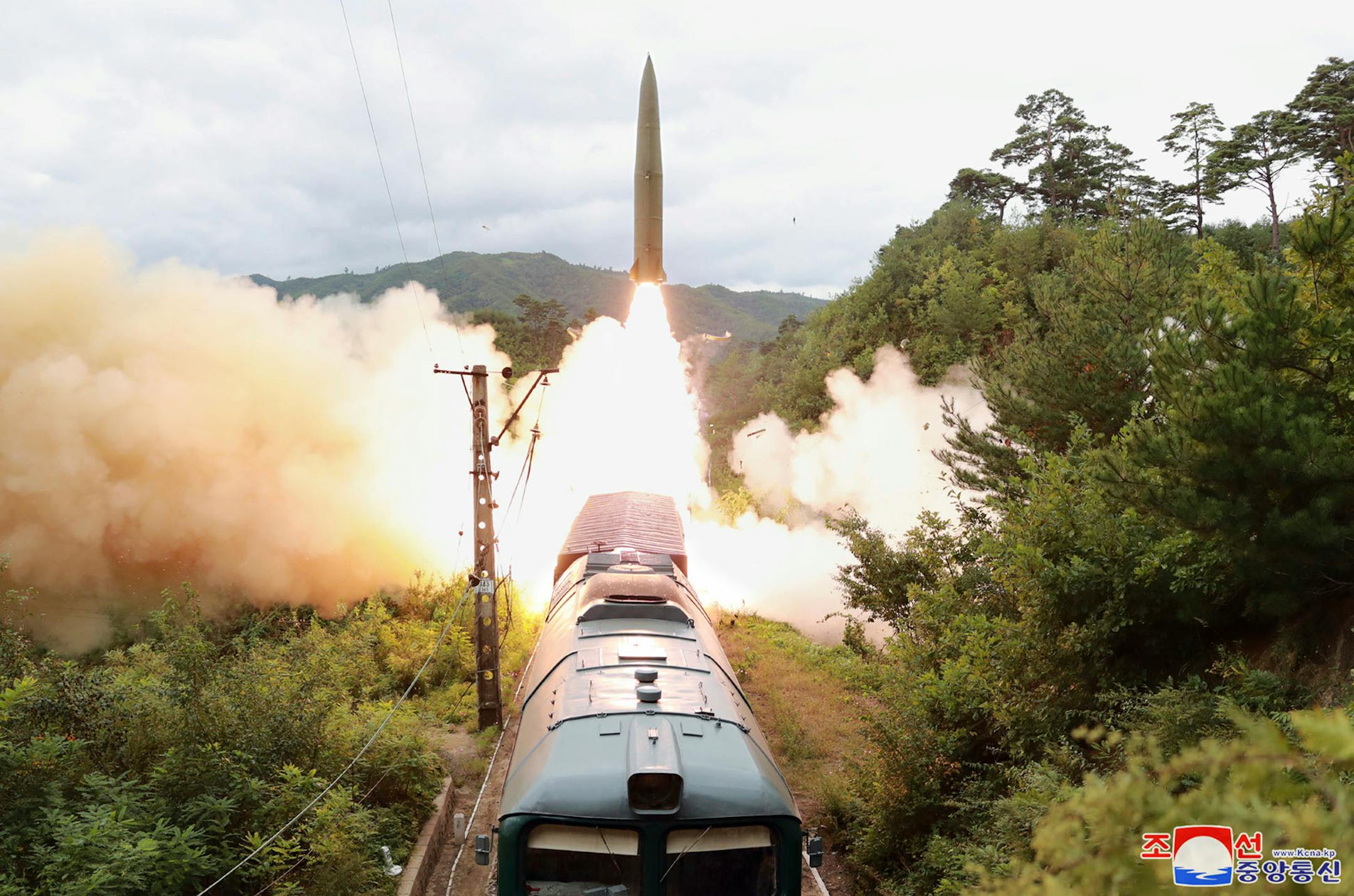 This photo provided by the North Korean government Thursday, Sept. 16, 2021, shows a missile test firing launched from a train on Sept. 15, 2021 in an undisclosed location of North Korea. North Korea says it succeeded in launching ballistic missiles from a train for the first time in part of continuing efforts to bolster its "war deterrence," a day after the two Koreas tested-fired missiles hours apart. Independent journalists were not given access to cover the event depicted in this image distributed by the North Korean government. The content of this image is as provided and cannot be independently verified. Korean language watermark on image as provided by source reads: "KCNA" which is the abbreviation for Korean Central News Agency. (Korean Central News Agency/Korea News Service via AP)