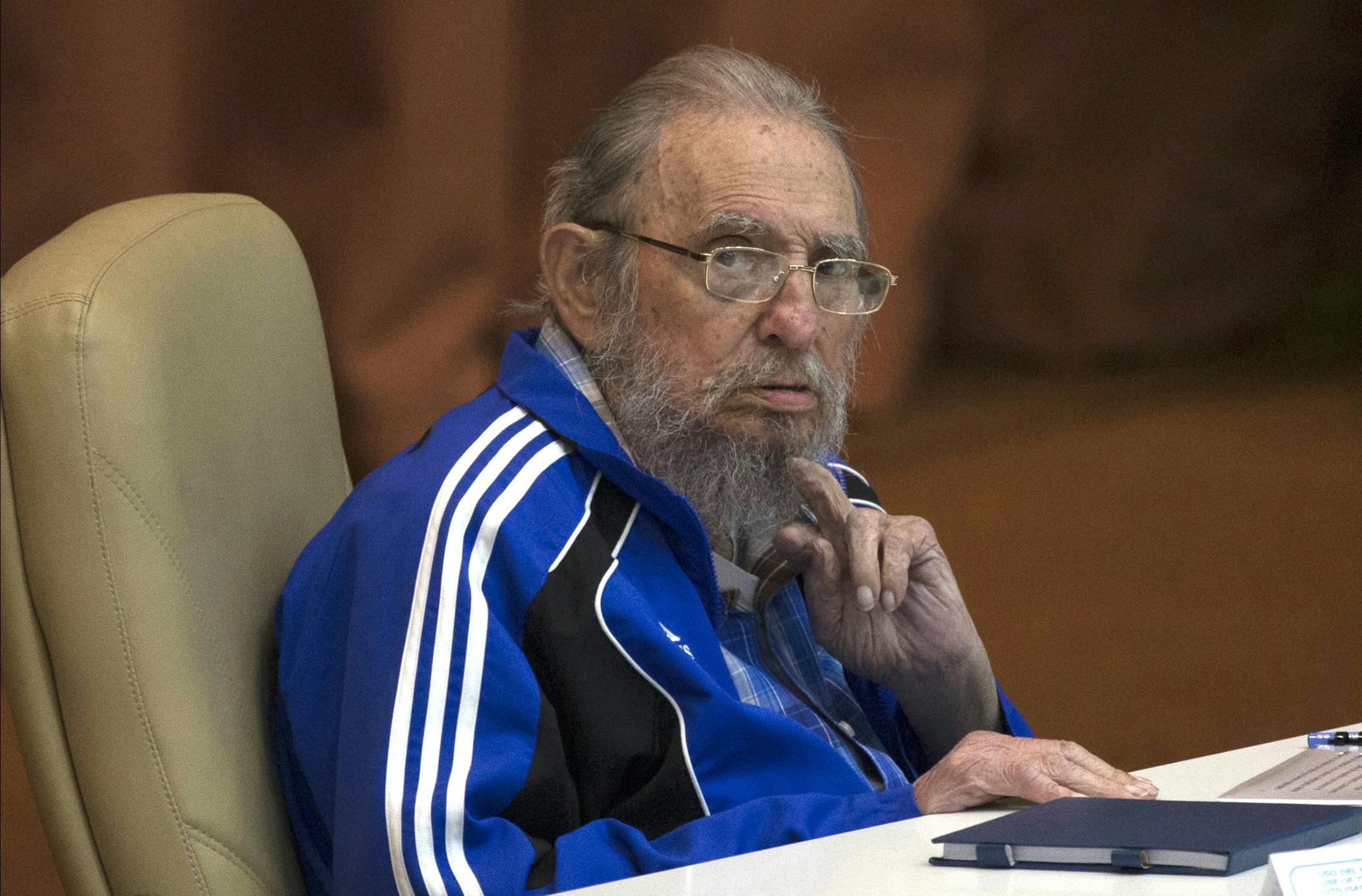 FILE - In this April 19, 2016 file photo, Fidel Castro attends the last day of the 7th Cuban Communist Party Congress in Havana, Cuba. Fidel Castro formally stepped down in 2008 after suffering gastrointestinal ailments and public appearances have been increasingly unusual in recent years. Cuban President Raul Castro has announced the death of his brother Fidel Castro at age 90 on Cuban state media on Friday, Nov. 25, 2016.†(Ismael Francisco/Cubadebate via AP, File)