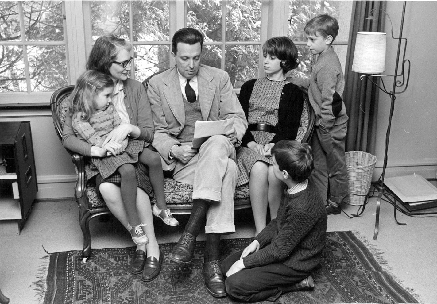 Minnesota writer J.F. Powers and family in 1963, the year he won the National Book Award for "Morte D'Urban." Pictured are: Jane, 4 on Betty's lap. Mary, 13, Hugh 7, James 8, is kneeling. Not present, oldest daughter Katherine Anne.