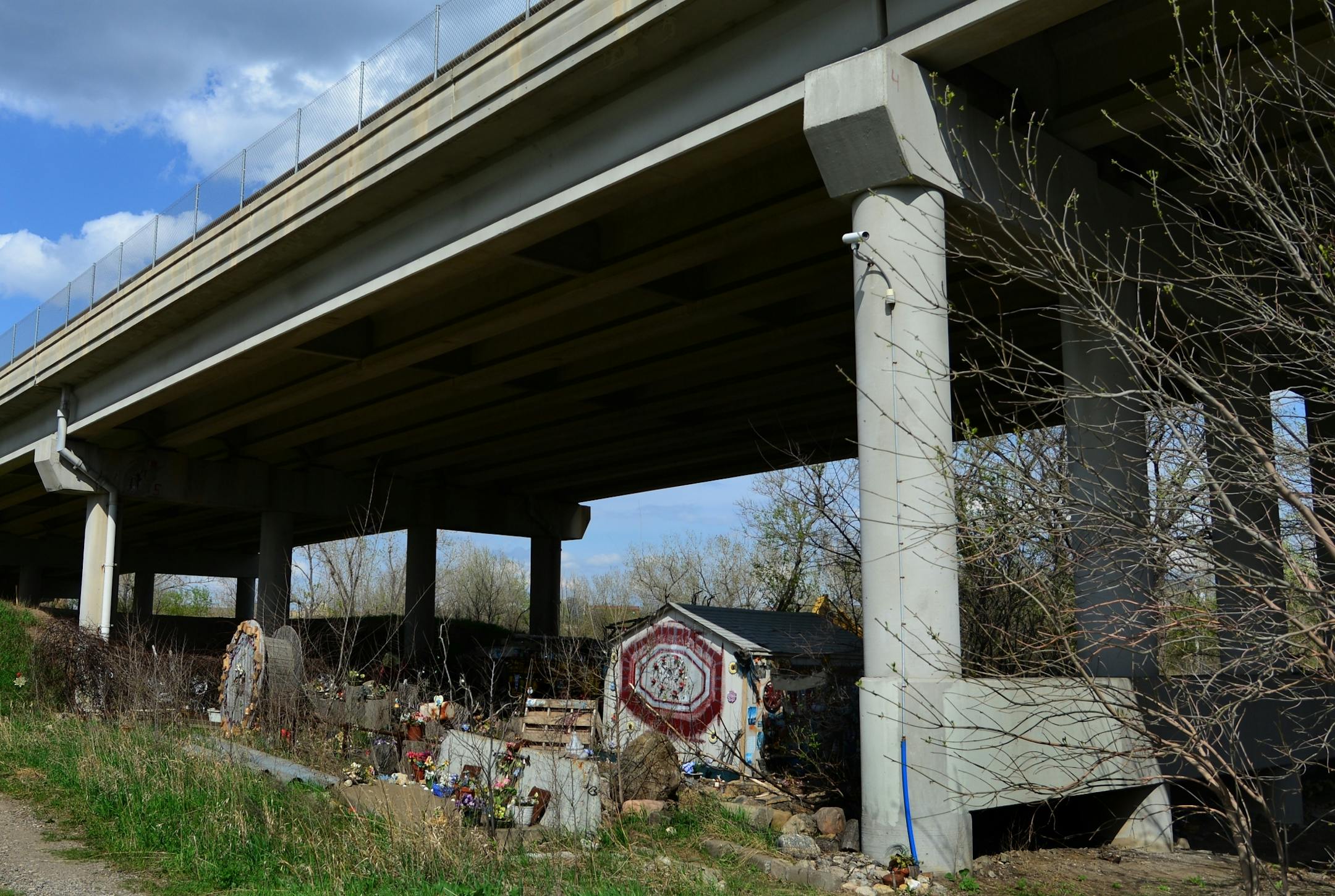 There is a construction project that extends a bike path under the 10th Street Bridge.This small shack . sits directly under the bridge and very close to the new route for the bike path
