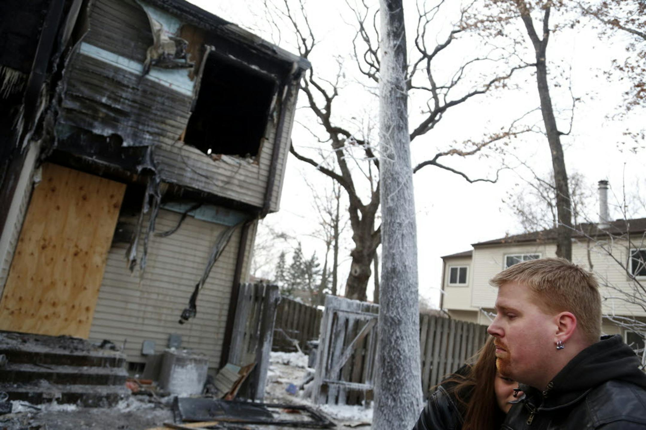 Thor Yarusso, right, with Kelly Trainor, lost his brother Roger Yarusso Jr. in the fire that burned the townhouse where Roger lived. "He was the best brother you could ever have," said Thor Yarusso, who was part of a small group of friends who had marked Roger's 33rd birthday the night before.