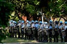 FILE -- U.S. Park Police officers near the White House on June 1, 2020, when hundreds of protesters were forcibly cleared from Lafayette Square before
