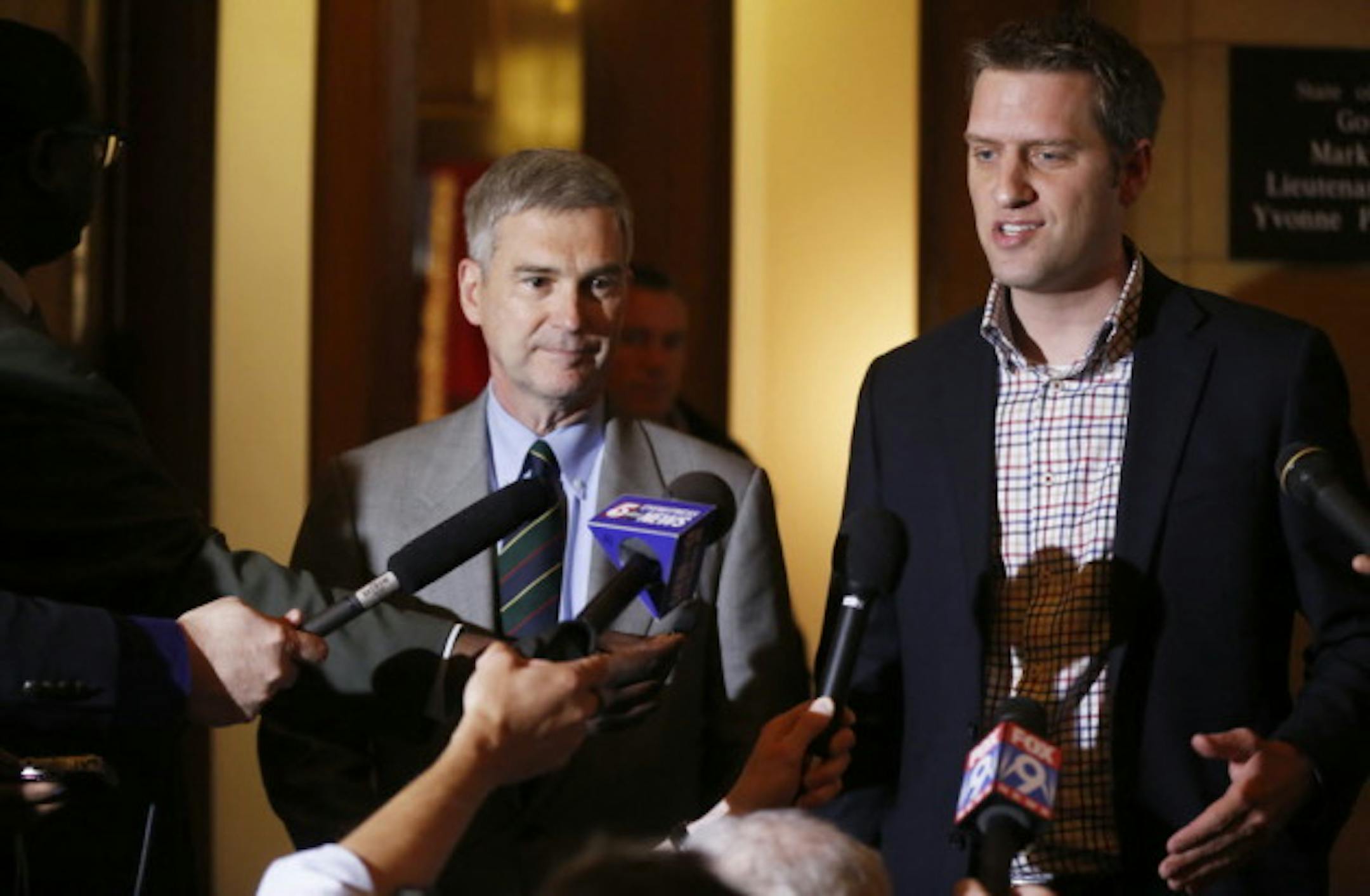 Senate Minority Leader David Hann and House Minority Leader Kurt Daudt in May of 2013