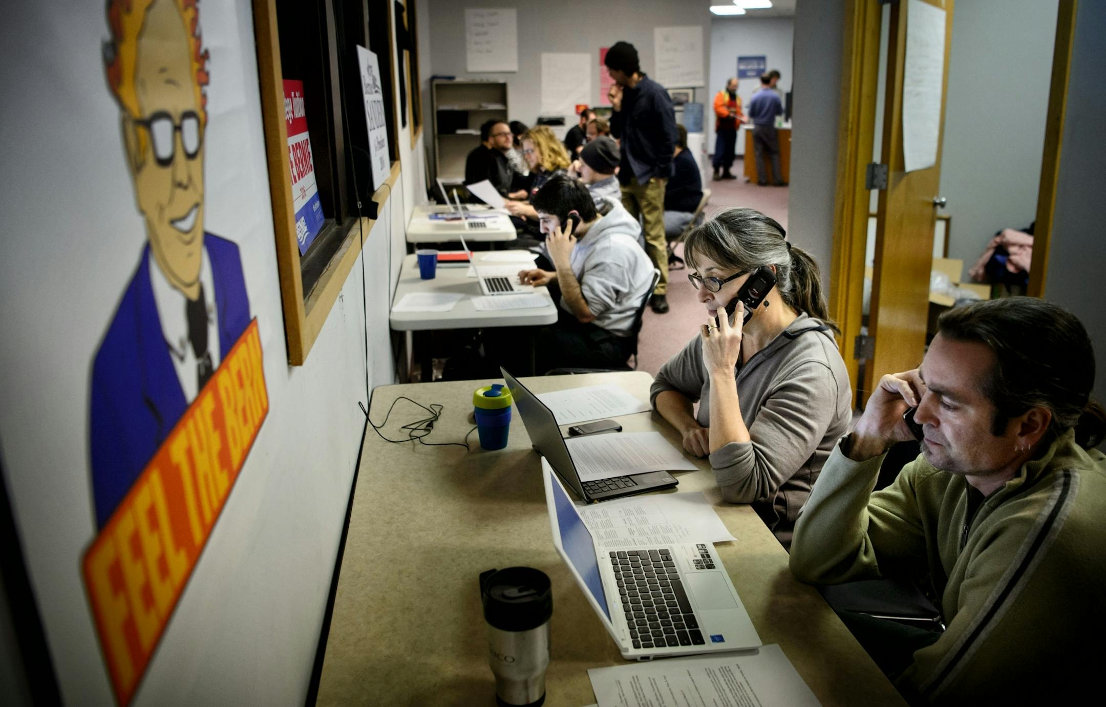 Jonathan Scott and his wife, Tammy Iverson, worked the phones at the Bernie Sanders headquarters in St. Paul. Sanders will be in the Twin Cities on Friday for two appearances.