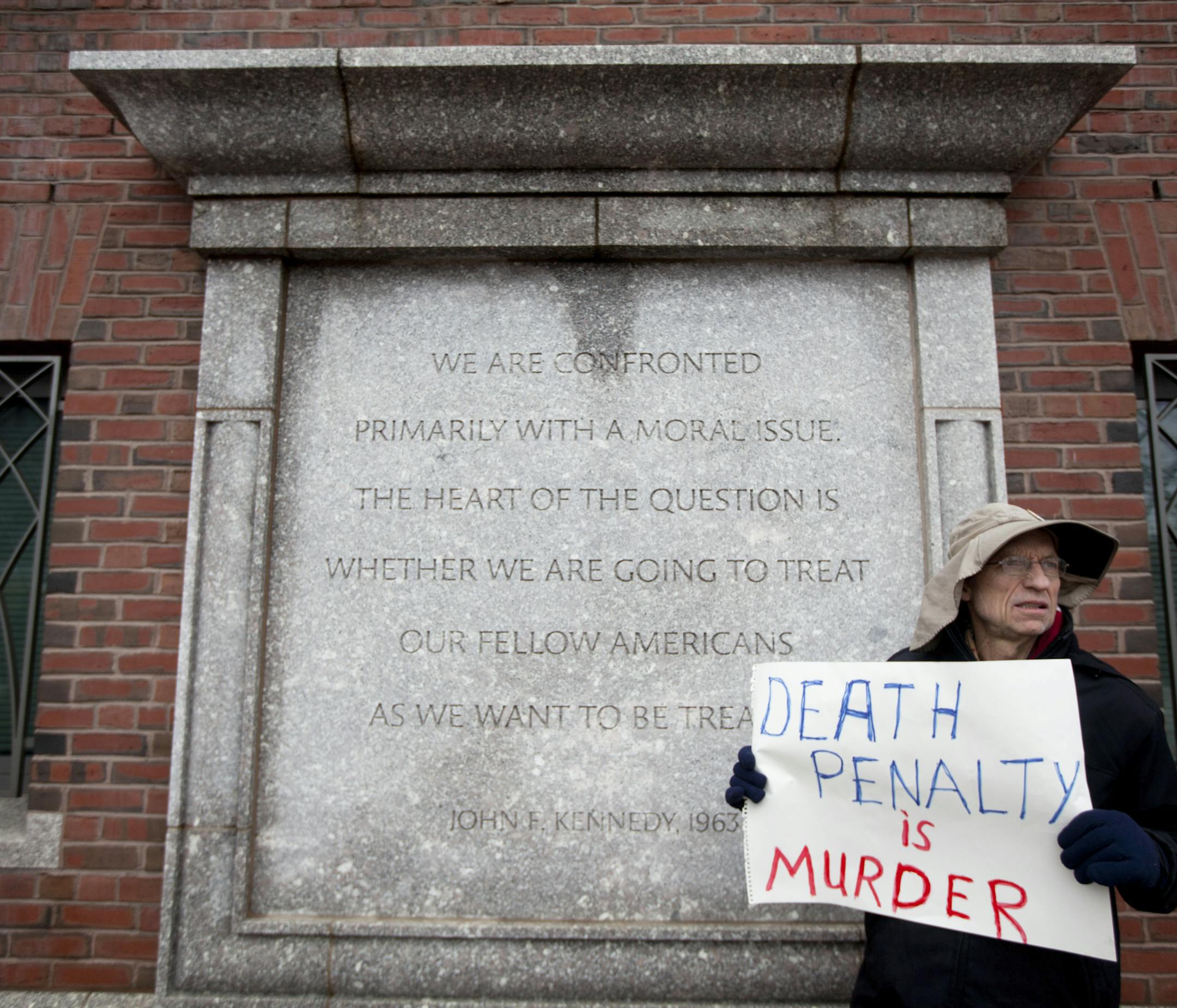 Joe Kebartas protests outside the John Joseph Moakley Courthouse in Boston, the morning of March 4, 2015. Opening arguments in the trial of Dzhokhar Tsarnaev, charged in the 2013 Boston Marathon bombings that killed three and injured 260, began there Wednesday. (Erik Jacobs/The New York Times)