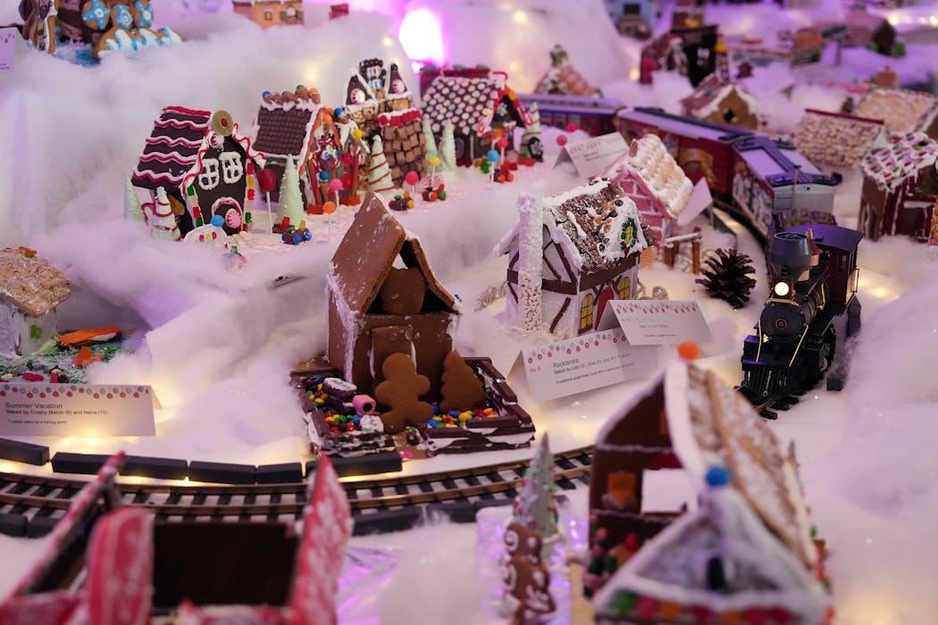 A toy train winds through the more than 200 gingerbread structures on display during the Norway House’s Gingerbread Wonderland exhibit.