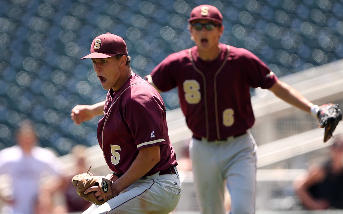 Springfield's Sam Baier, left, celebrated during the Class 1A championship game at Target Field in 2016