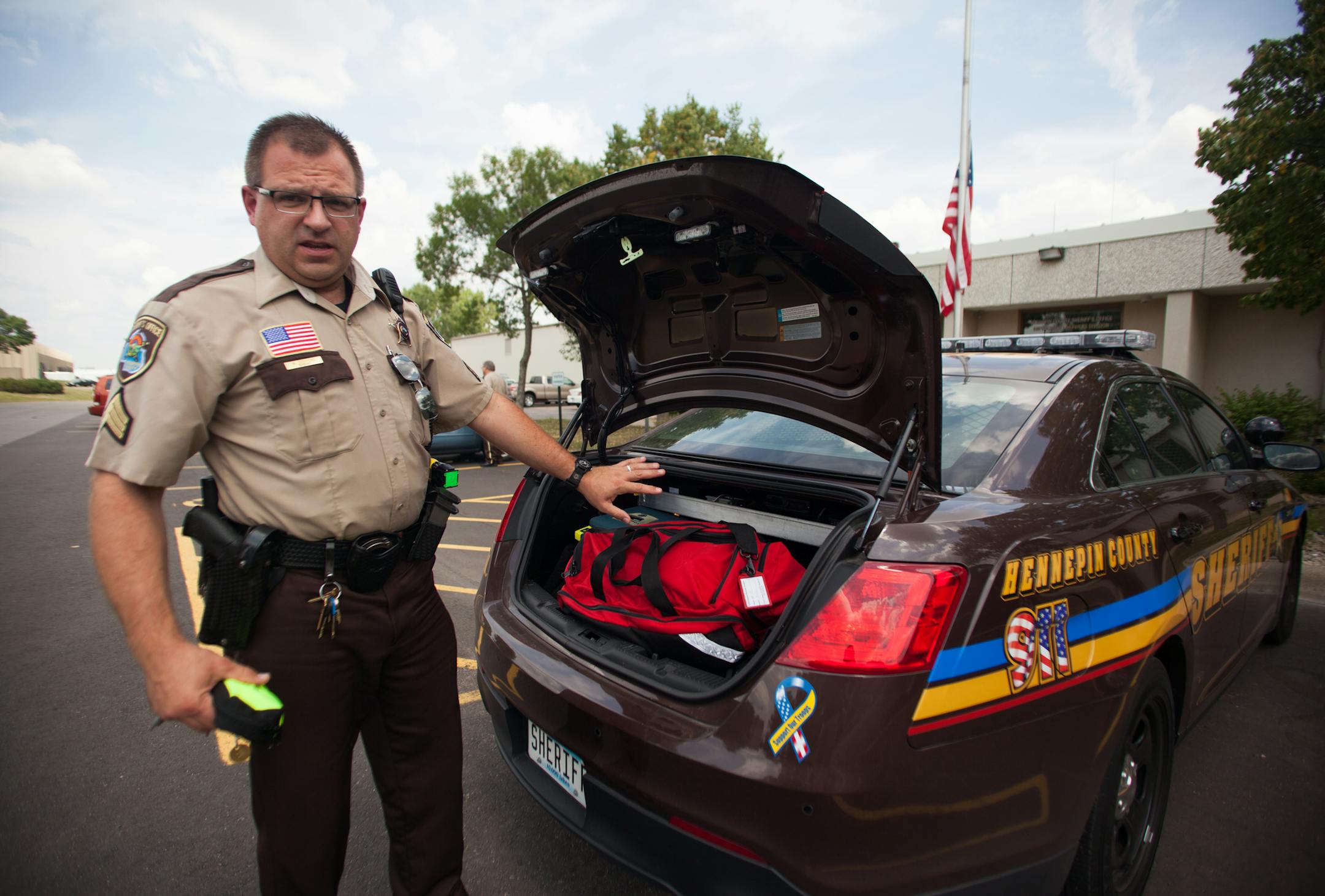 Sergeant Matther Steffens leaves his first aid kit in the trunk and keeps the Narcan kit with him in the car. "Narcan need to be in a cooler temperature," He explained. The Star Tribune, Shelly Yang