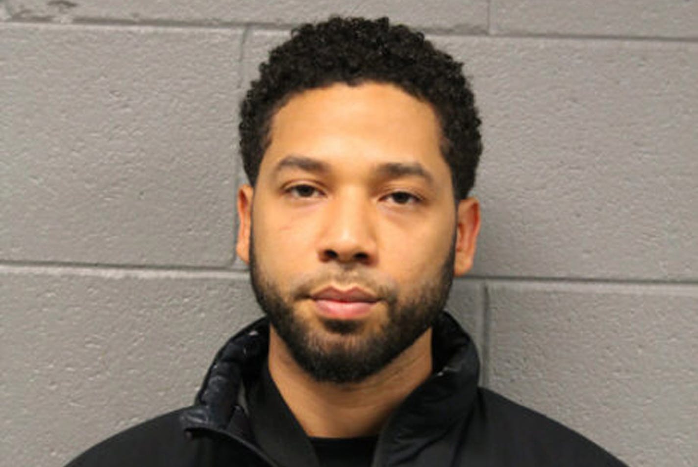 This Feb. 21, 2019 photo released by the Chicago Police Department shows Jussie Smollett. Police say the "Empire" actor turned himself in early Thursday to face a charge of making a false police report when he said he was attacked in downtown Chicago by two men who hurled racist and anti-gay slurs and looped a rope around his neck. (Chicago Police Department via AP)