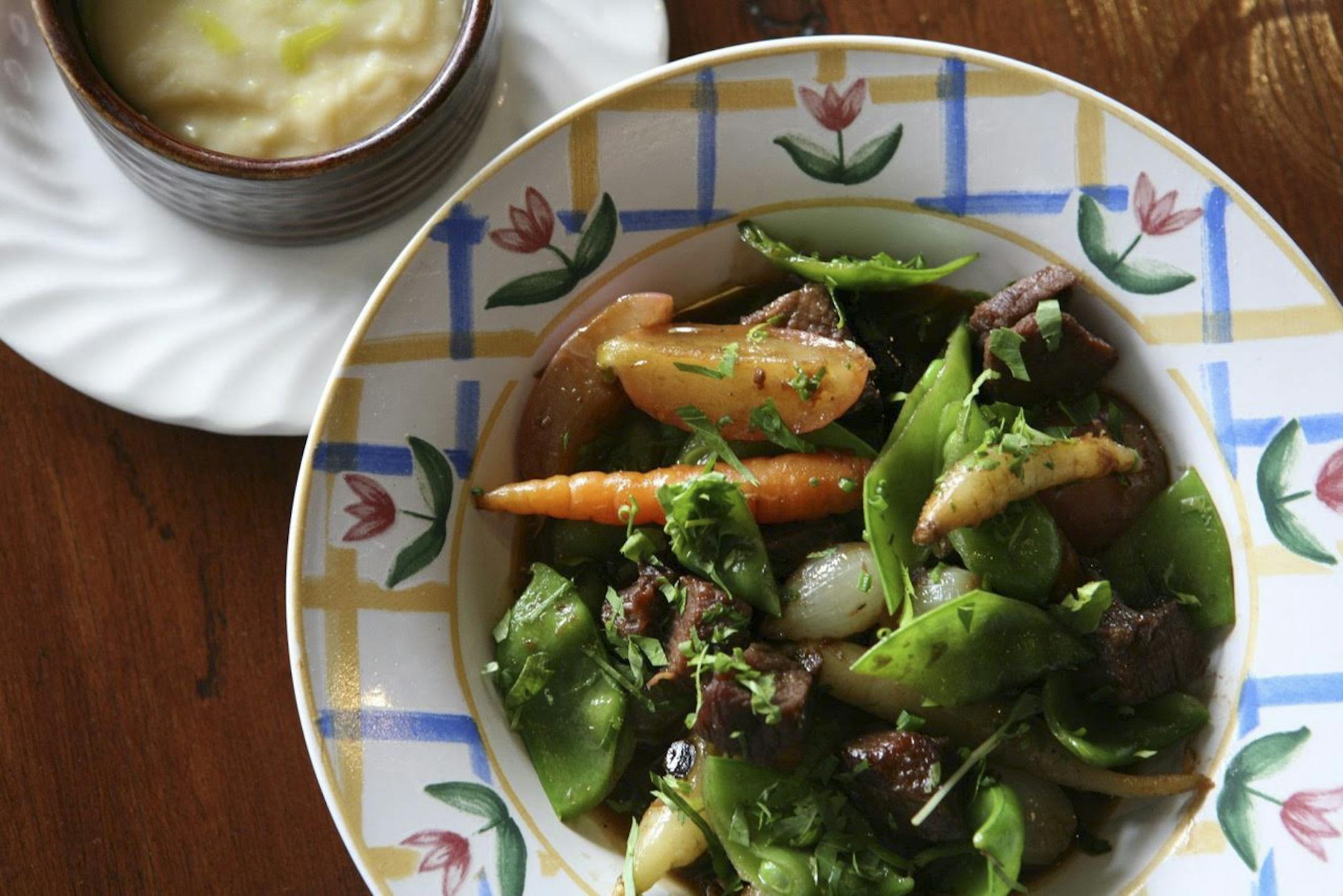 PHOTO MOVED IN ADVANCE AND NOT FOR USE - ONLINE OR IN PRINT - BEFORE NOV. 22, 2015. &#x2014; In an undated handout photo, pot au feu with potatoes aligot from Le Bouillon in the Old Market district of Omaha, Neb. The menu draws from various regions of France, but also serves oysters flown in from American coasts and local ingredients. (Handout via The New York Times) -- NO SALES; FOR EDITORIAL USE ONLY WITH STORY SLUGGED NEB FRENCH RESTAURANT BY CHARU SURI. ALL OTHER USE PROHIBITED. --