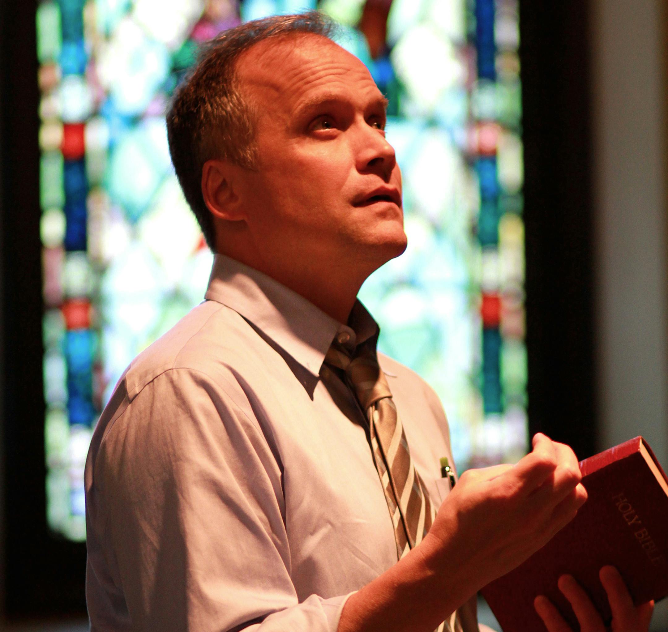 Andrew Erskine Wheeler as Pastor Paul in Walking Shadow Theatre Company's "The Christians." photo by Amy Rummenie