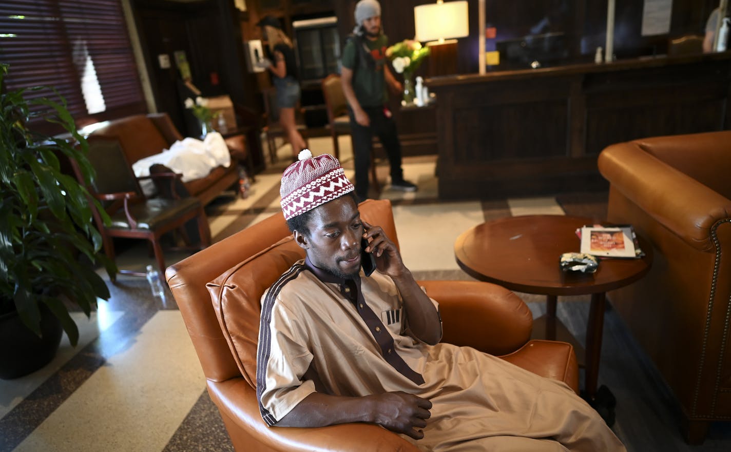 Abu Bakr, now a resident at the hotel, made a call in the lobby Wednesday afternoon. He was living in his car before last week's unrest, but his car was lit on fire. ] aaron.lavinsky@startribune.com When unrest broke out on Lake Street last week, an organized group of volunteers came together to secure a space for the homeless on the streets that were potentially in danger. That hotel became the Midtown Sheraton, which has since been turned into a sanctuary, with volunteers working around the cl