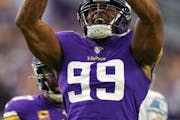 Minnesota Vikings defensive end Danielle Hunter (99) celebrated after he sacked Detroit Lions quarterback David Blough (10) for the first time in the 