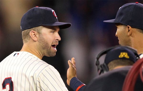 Second baseman Brian Dozier (2) wants to stay with the Twins but knows it's not his decision.
