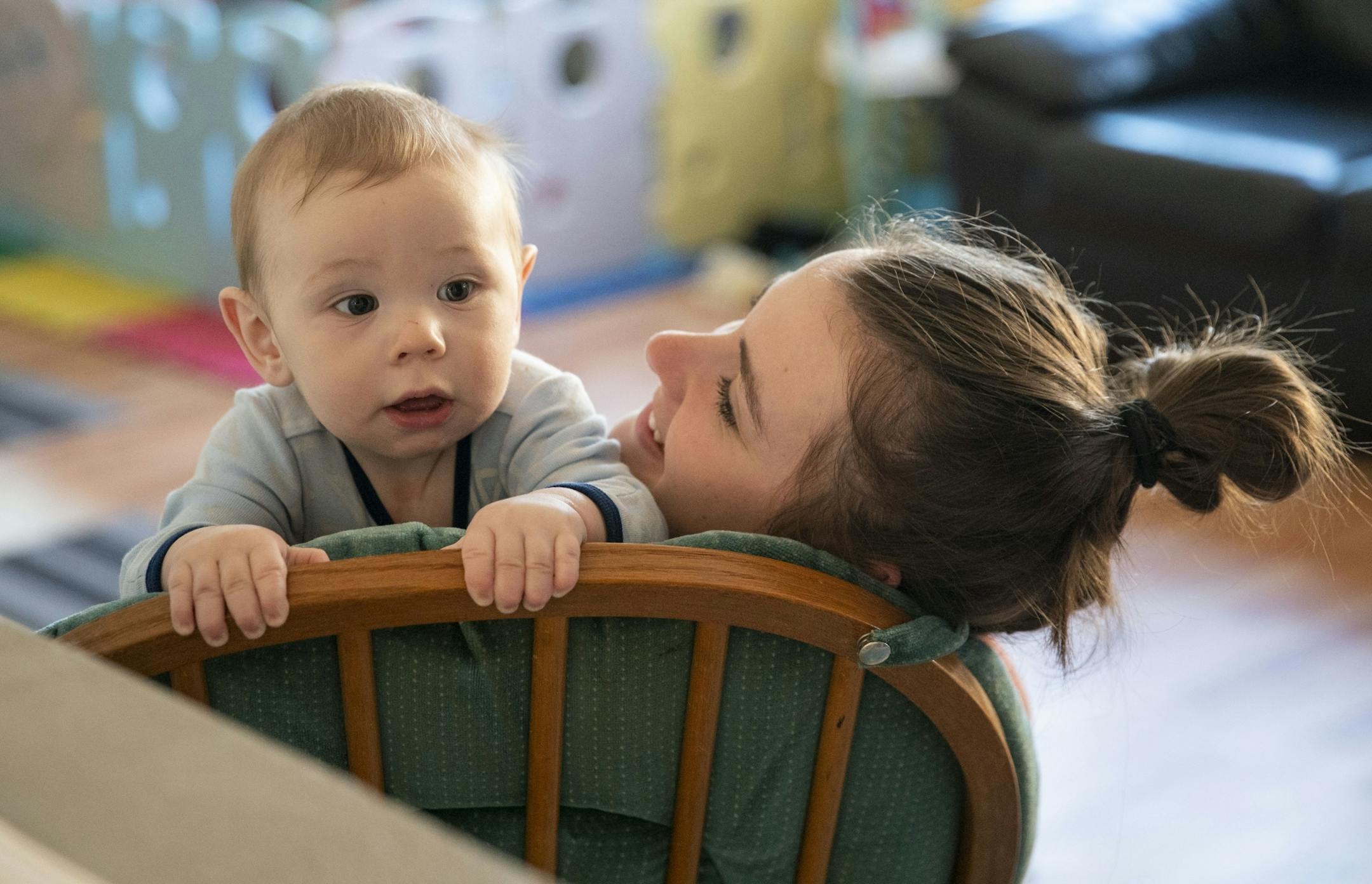 Emily Bates played with 8-month-old Beckham at Aunty's Child Care in Duluth, MN on Thursday.