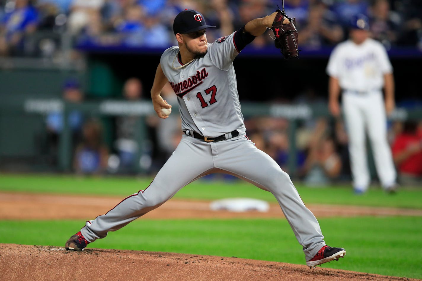 Twins starting pitcher Jose Berrios delivers to a Kansas City batter during the first inning